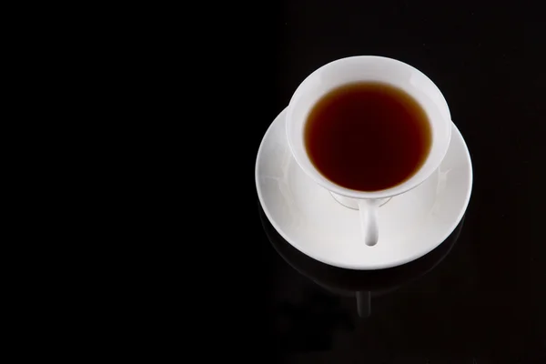 Té sobre fondo negro — Foto de Stock