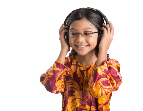 Junges Mädchen mit Kopfhörer — Stockfoto