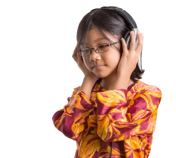 Jong meisje met hoofdtelefoon — Stockfoto