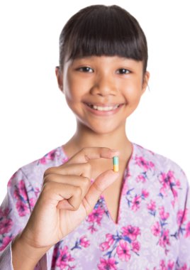 Young Girl And Medicine Tablets clipart