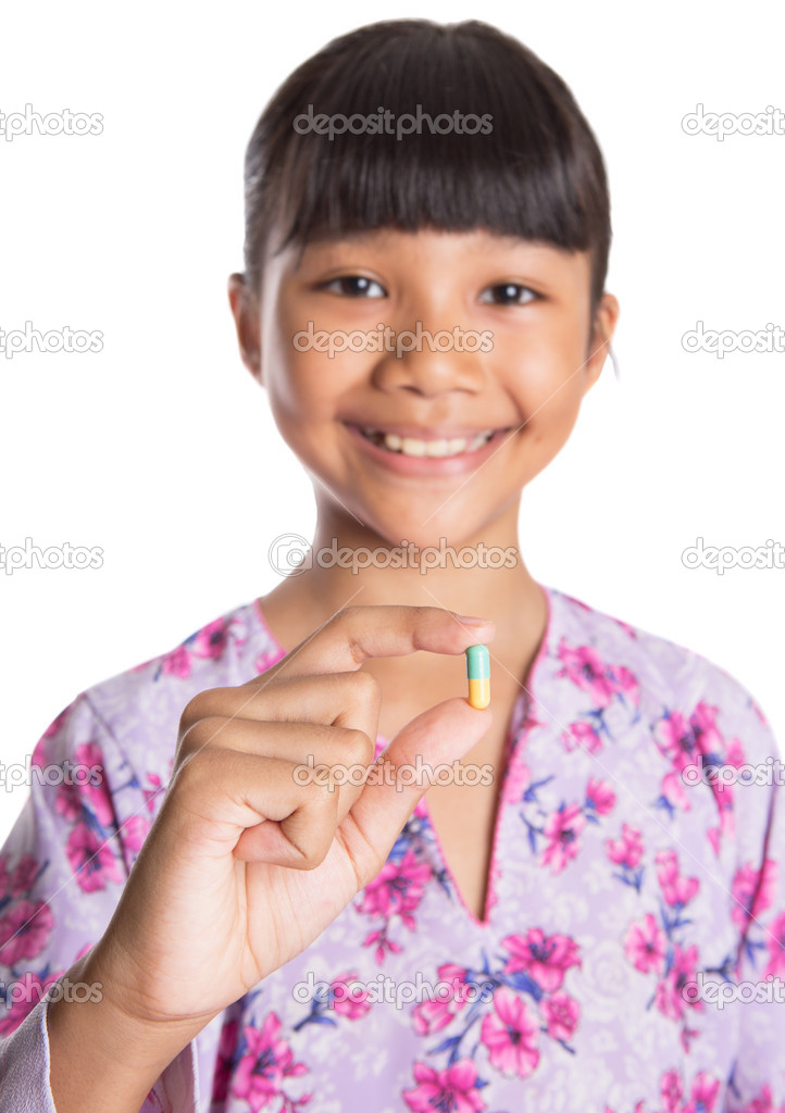 Young Girl And Medicine Tablets