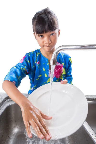 Joven chica lavando platos —  Fotos de Stock