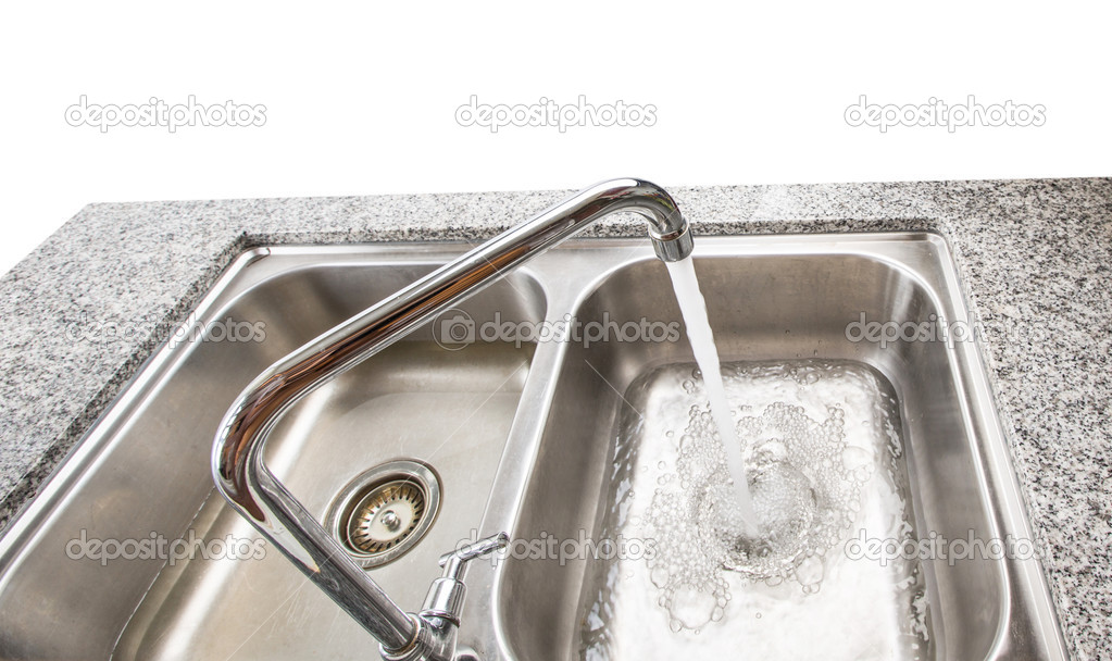 Water Pouring From Faucet