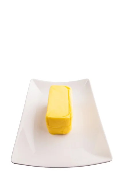 Масло на белом фоне — стоковое фото
