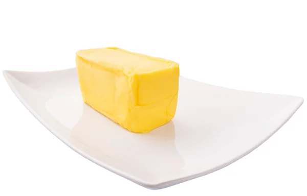Mantequilla sobre fondo blanco — Foto de Stock