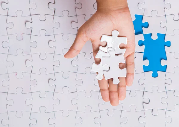 Girl Hand Playing Jigsaw Puzzle — Stock Photo, Image