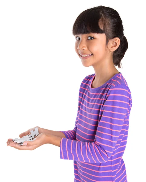 ジグソー パズルのピースを持つ若い女の子 — ストック写真