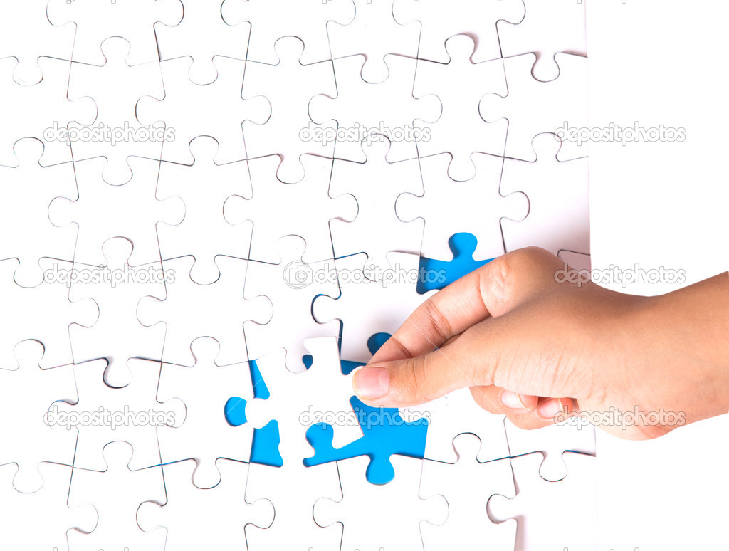 Girl Hand Playing Jigsaw Puzzle