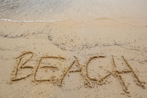 Palabra de playa en arena — Foto de Stock