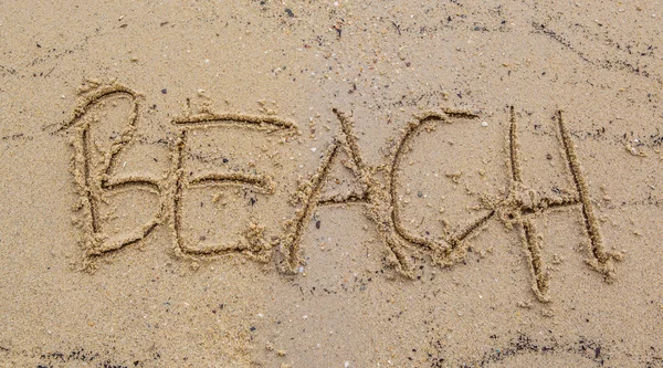 Palabra de playa en arena — Foto de Stock