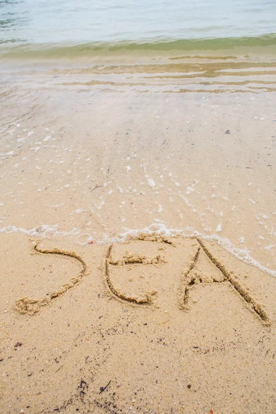 Arena con palabra de mar —  Fotos de Stock