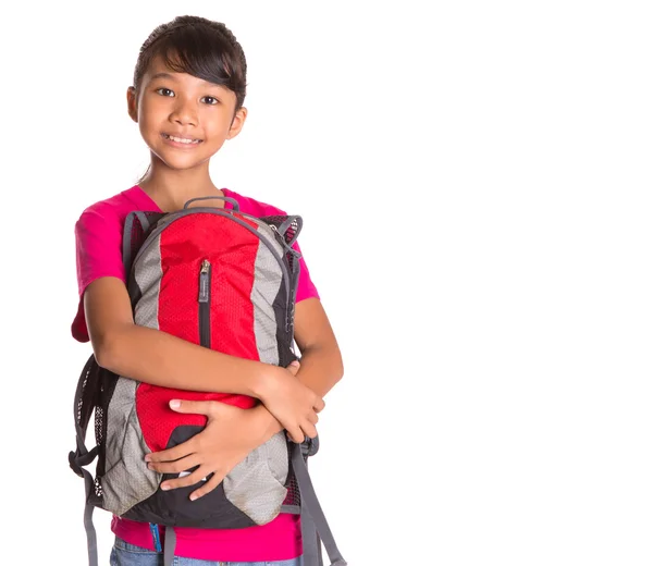 Junges Mädchen mit Rucksack — Stockfoto