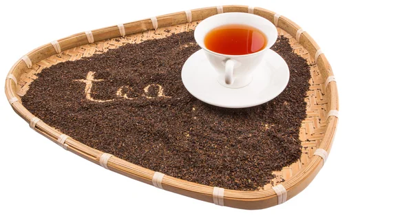 Una taza de té en bandeja de mimbre — Foto de Stock