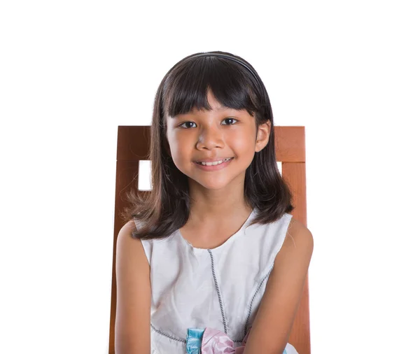 Young Girl On Wooden Chair — Stock Photo, Image