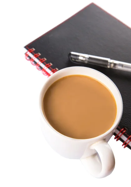 Notebook, kaffe och kulspetspenna — Stockfoto