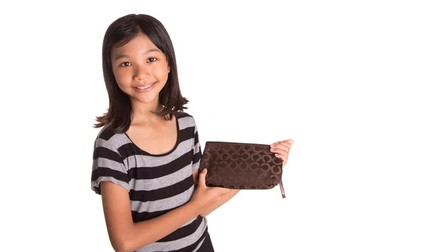 Молодая девушка с коричневой сумкой — стоковое фото