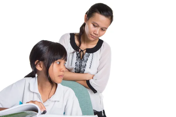 Jonge school meisje met leraar — Stockfoto