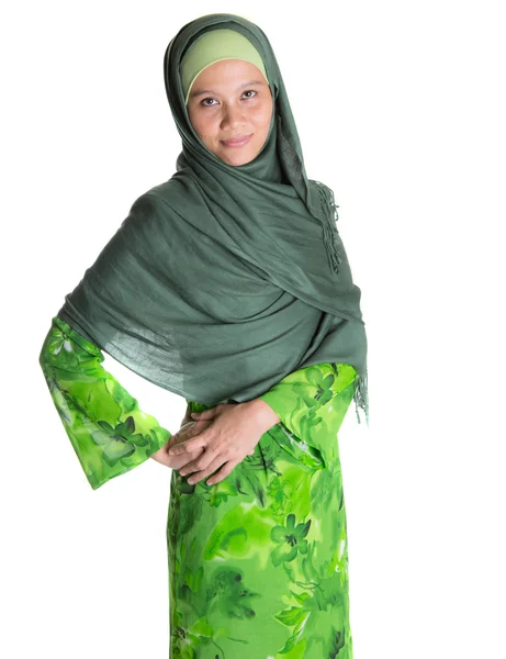 Moslimvrouw groene jurk — Stockfoto