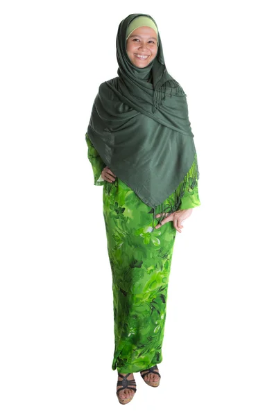 Moslimvrouw groene jurk — Stockfoto
