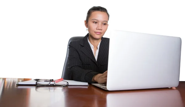 Asian Businesswoman At Her Office Desk Royalty Free Stock Images