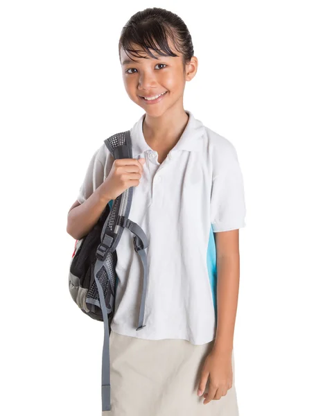 Menina na escola uniforme e mochila — Fotografia de Stock