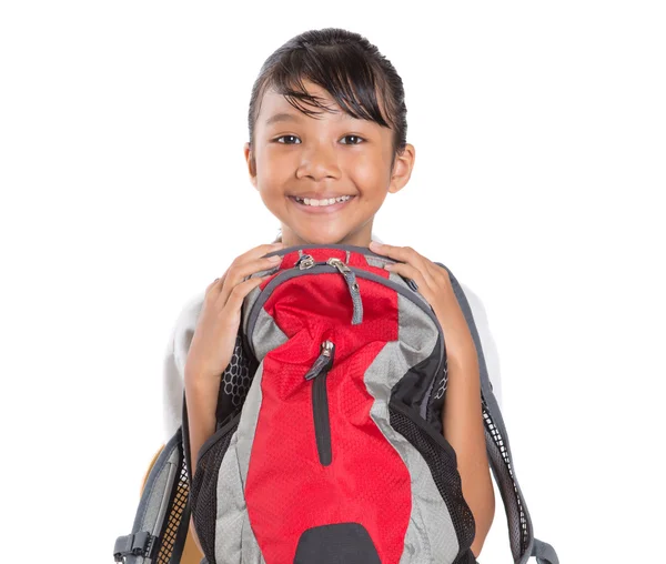 Menina na escola uniforme e mochila — Fotografia de Stock