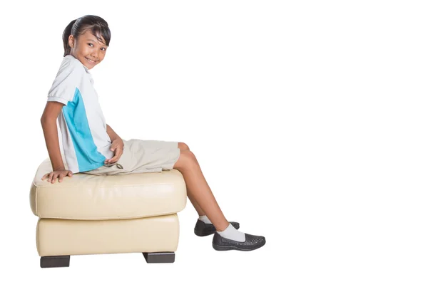 School Girl Sitting On Couch — Stock Photo, Image