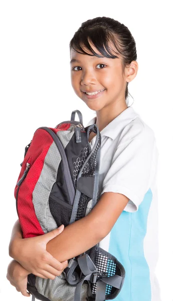 Menina na escola uniforme e mochila — Fotografia de Stock