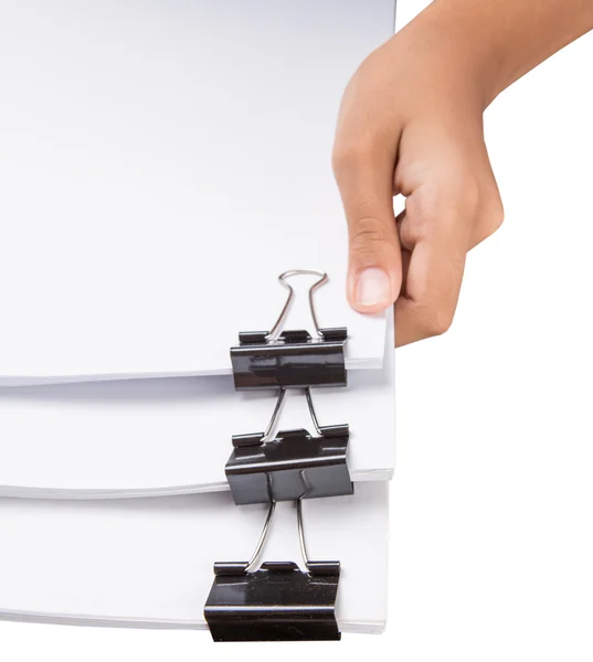 Hand holding white paper with binder clips — Stock Photo, Image