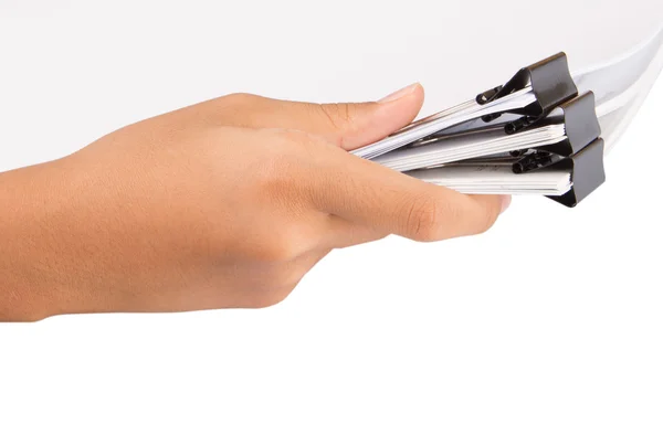 Hand holding white paper with binder clips — Stock Photo, Image
