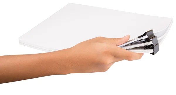 Hand met wit papier met bindmiddel clips — Stockfoto