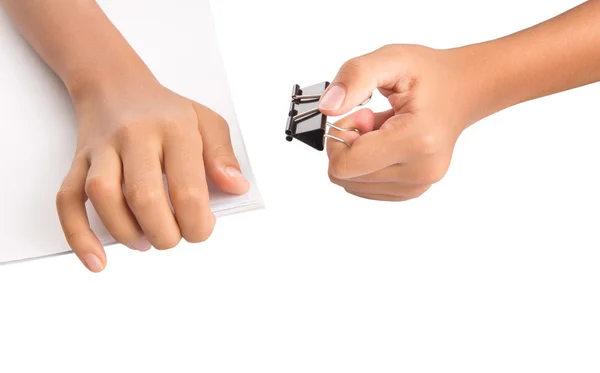 Hand holding white paper with binder clips — Stock Photo, Image