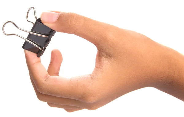 Female hand holding binder clip — Stock Photo, Image