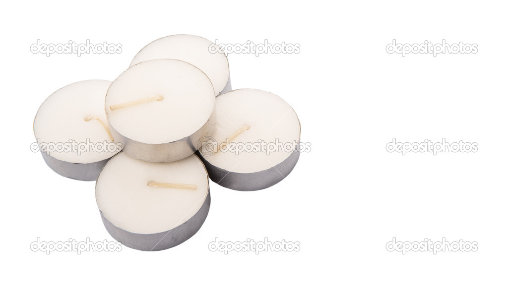 Small tealights over white background