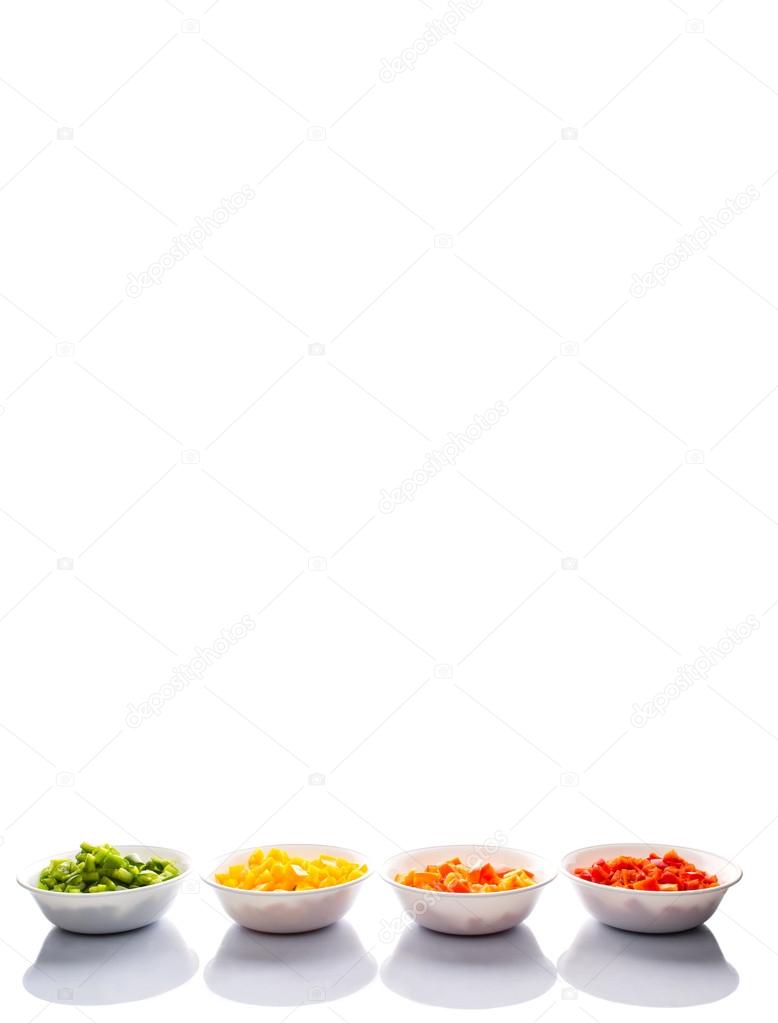Colorful Chopped Capsicums In White Bowls