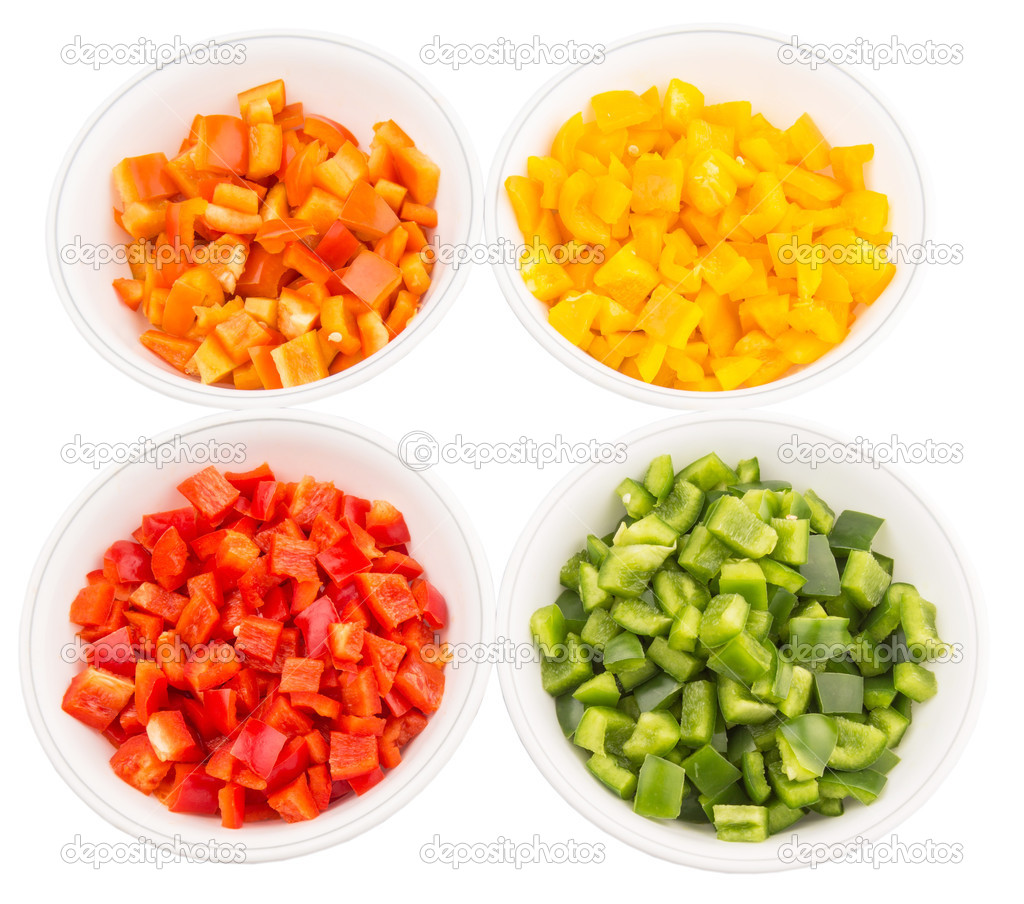 Colorful Chopped Capsicums In White Bowls