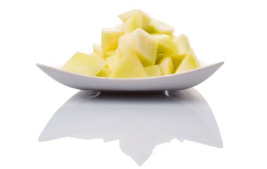 ısırık büyüklüğünde honeydew adet beyaz plaka üzerinde