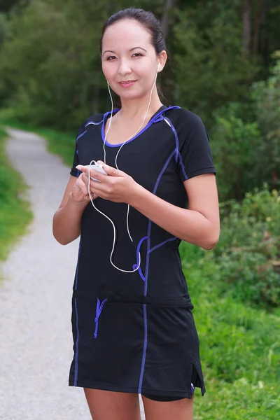Jogger com mp3 e fones de ouvido — Fotografia de Stock