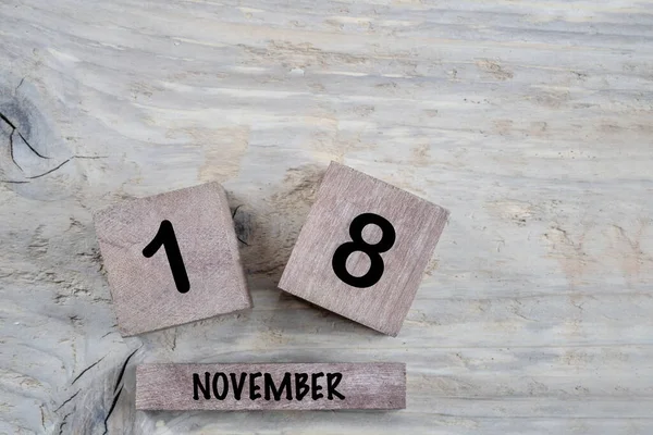 Closeup Kubus Kalender Voor November Een Houten Achtergrond Met Kopieerruimte — Stockfoto