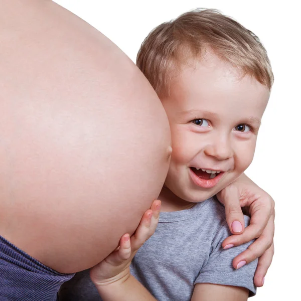 Junge und seine schwangere Mutter — Stockfoto