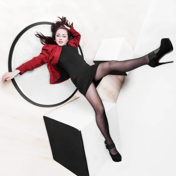 Leggy girl posing in studio — Stock Photo, Image