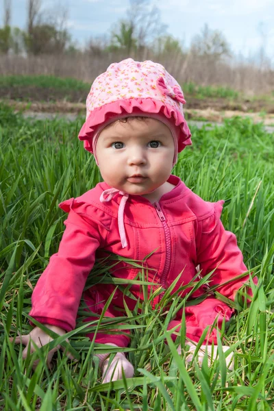 Baby im rosa Kleid — Stockfoto