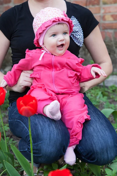 Bebê em um vestido rosa — Fotografia de Stock