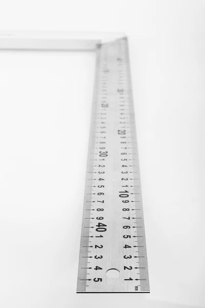 Metal ruler on white background — Stock Photo, Image