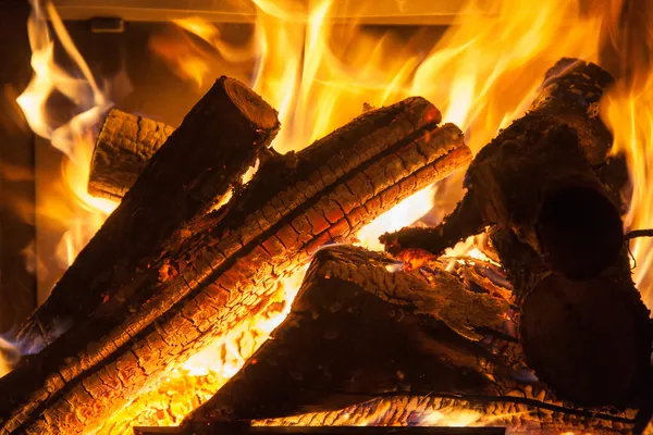 Burning billets in hot stove — Stock Photo, Image