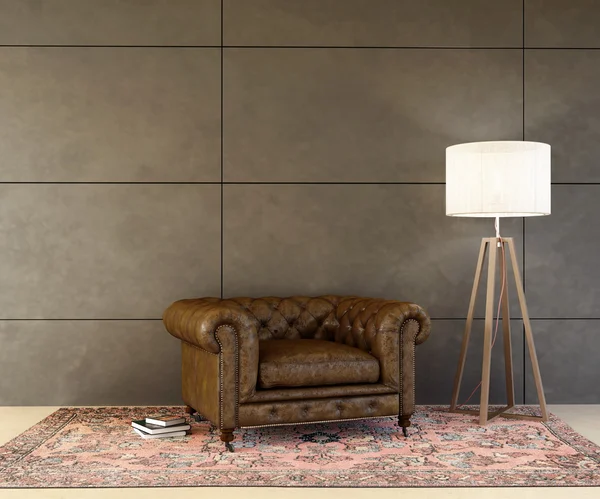 Old leather armchair with lamp in front of a modern wall — Stock Photo, Image