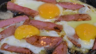 omelette. cooking eggs. Fried eggs fried eggs from 6 eggs fried in a pan. Hot appetizing dish that is eaten unmarried men and poor students. Different ways of cooking eggs.
