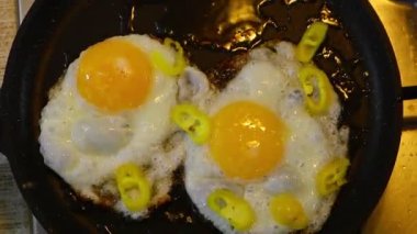 omelette. cooking eggs. Fried eggs fried eggs from 6 eggs fried in a pan. Hot appetizing dish that is eaten unmarried men and poor students. Different ways of cooking eggs.