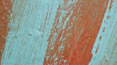 abstract blue-red background. brush strokes. metal texture. paint streaks. pieces of cut colored paper. the adhesive tape is painted in several layers. background of complex color texture
