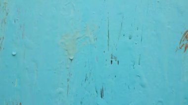 abstract blue background. paint streaks. blue metal. blue color texture. blue abstract. brush marks. paint streaks. paint drops. Brush strokes of paint. Modern art. abstract art background.